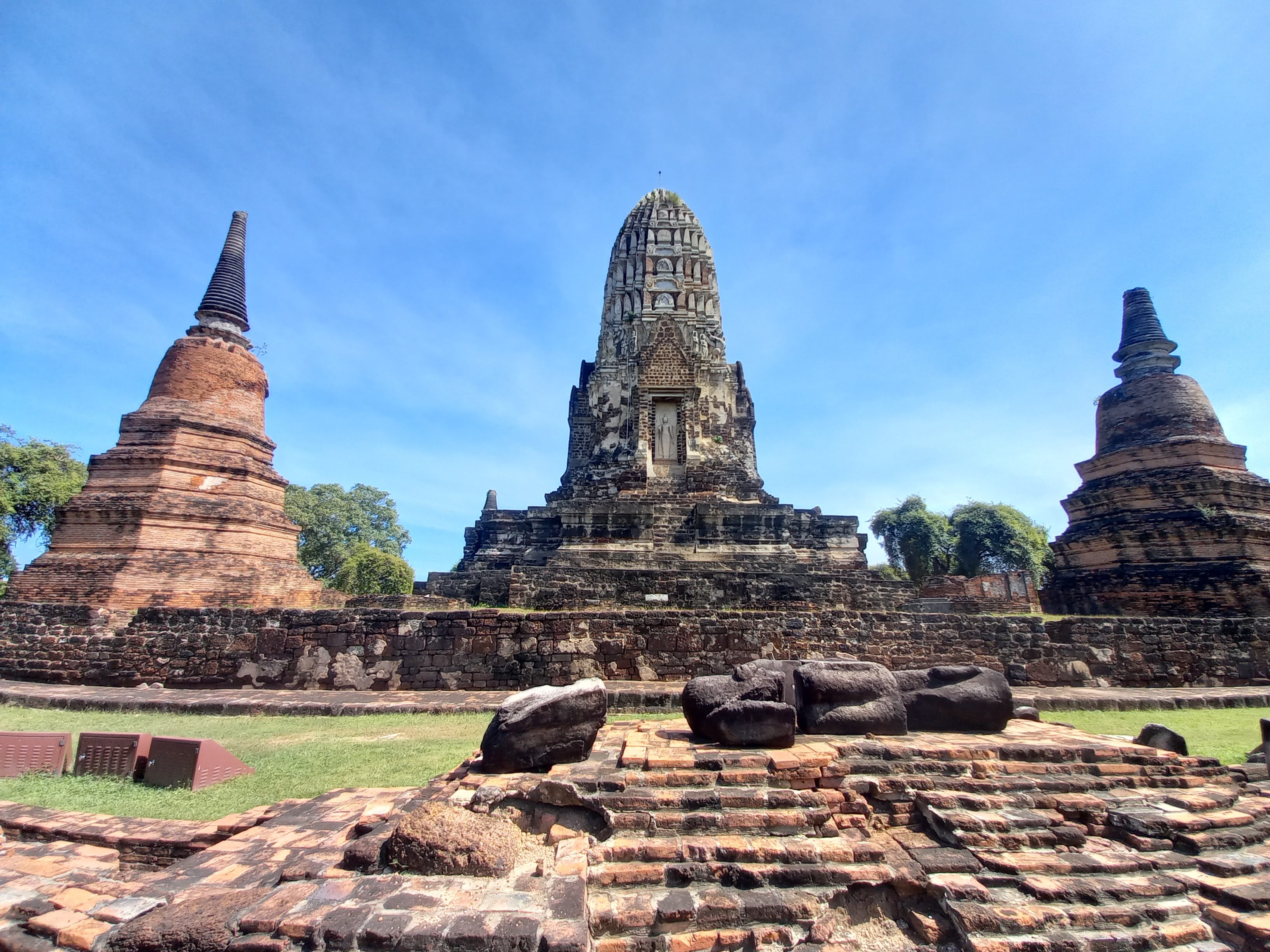 Wat Mahathat Buddha head in tree roots at Ayutthaya